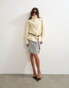 Model wearing Funnel neck shirt in buttermilk