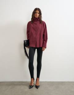 Model wearing Funnel neck shirt in fig
