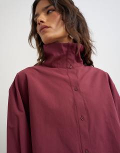 Model wearing Funnel neck shirt in fig