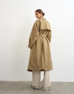 Model wearing Funnel neck trench in camel