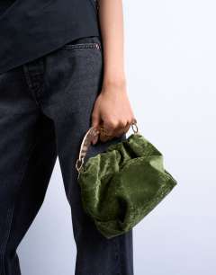Model wearing Gabriette velvet metal trim handle grab bag in khaki