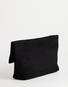Model wearing Gaia suedette clutch bag with hardware in black