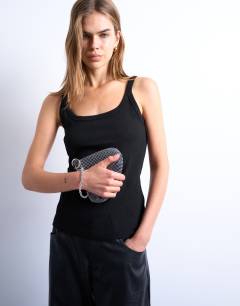 Model wearing Galaxy small diamante grab bag in navy