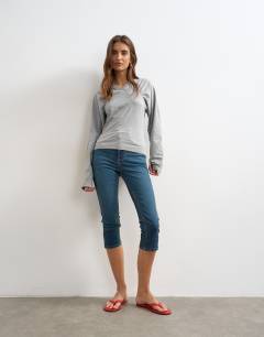 Model wearing Gather yoke seam long sleeve top in grey marl