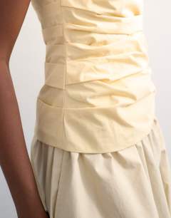 Model wearing Gathered bandeau top in buttermilk