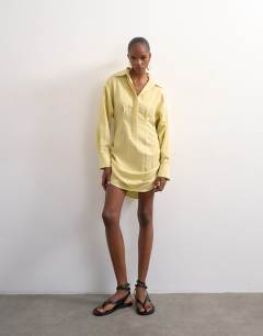 Model wearing Gathered skirt mini shirt dress in yellow
