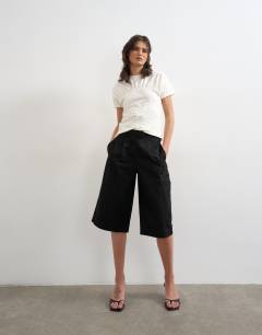 Model wearing Gathered yoke cap sleeve t-shirt in ecru