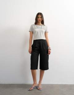 Model wearing Gathered yoke cap sleeve t-shirt in grey marl