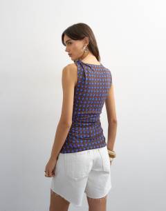 Model wearing Geometric print beaded tank in blue