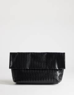 Model wearing George weave oversized clutch bag in black