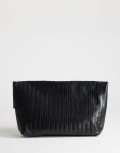 Model wearing George weave oversized clutch bag in black