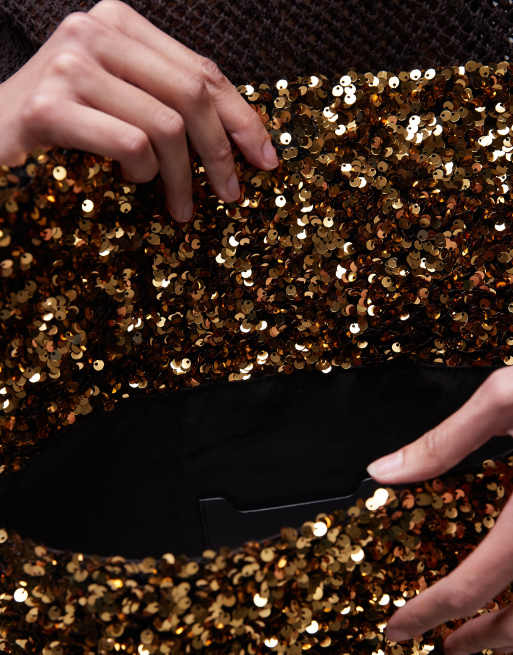 Topshop Georgia folded clutch bag in gold sequins