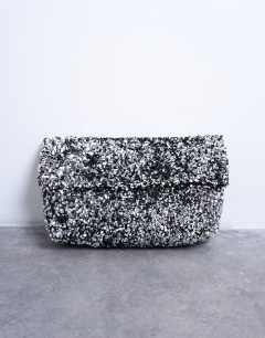 Model wearing Georgia folded clutch grab sequin bag in silver