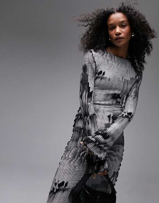 Topshop - Geribbelde midi jurk met vervaagde bloemenprint en overlock-naden in zwart-wit