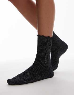 Topshop - Gerippte Glitzer-Socken in Schwarz mit Rüschenrand-Silber