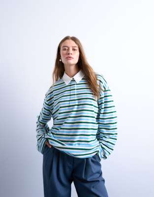 Topshop - Gestreiftes Polohemd aus Frottee in Blau und Grün-Weiß