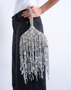Model wearing Giana sequin tassel grab bag in silver