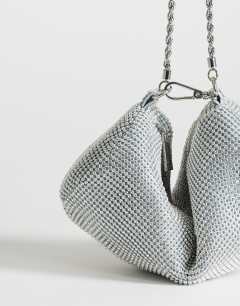 Model wearing Ginny small diamante grab bag in silver
