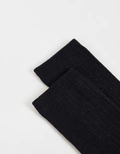 Model wearing Glitter socks in black