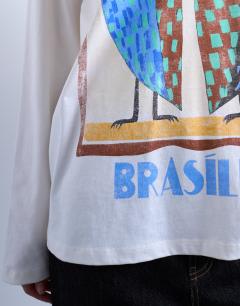 Model wearing Graphic Brasilia contrast ringer skater tee in white