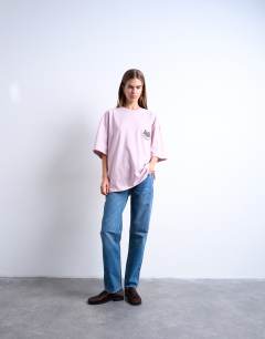 Model wearing Graphic ciliegia back print oversized tee in pink