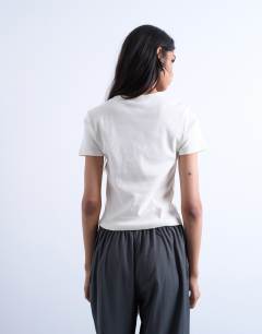 Model wearing Graphic cin cin baby tee in white
