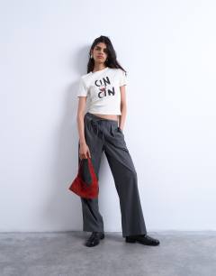 Model wearing Graphic cin cin baby tee in white