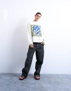 Model wearing Graphic floral print skater tee in ecru