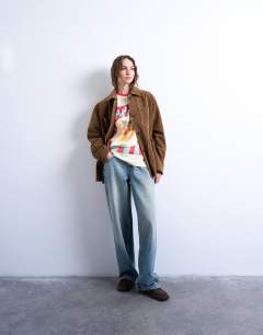 Model wearing Graphic Napoli contrast ringer oversized tee in ecru