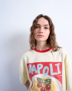 Model wearing Graphic Napoli contrast ringer oversized tee in ecru