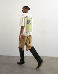 Model wearing Graphic 'No. 1' oversized t-shirt in ecru