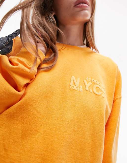 Topshop graphic NYC sweatshirt in orange part of a set