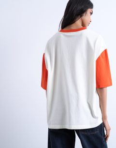 Model wearing Graphic oversized pizzeria tee with contrast sleeves in white