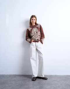 Model wearing Graphic paisley long sleeve skater tee in brown