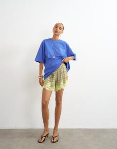 Model wearing Graphic 'Palm' oversized t-shirt in blue
