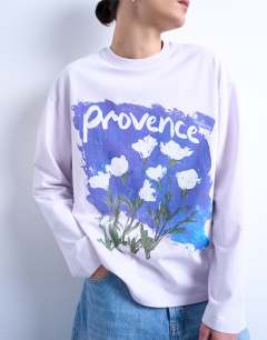 Model wearing Graphic Provence skater tee in lilac