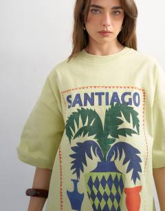Model wearing Graphic Santiago oversized tee in green