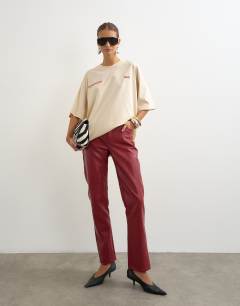 Model wearing Graphic 'Studio Archive' oversized t-shirt in ecru