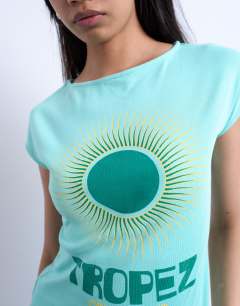 Model wearing Graphic Tropez cap sleeve slash neck baby tee in teal