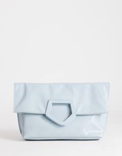 Model wearing Gregry folded oversized clutch bag in blue croc