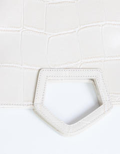 Model wearing Gregry folded oversized clutch bag in off white croc