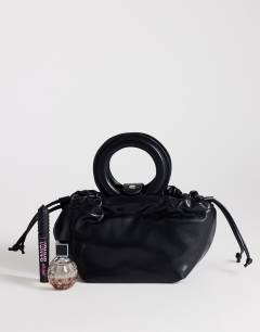 Model wearing Grette grab bag in black