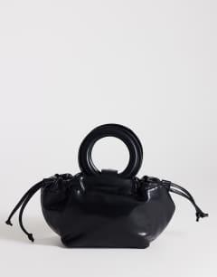Model wearing Grette grab bag in black