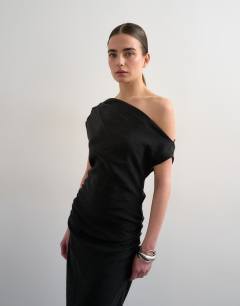 Model wearing Grown on shoulder maxi dress in black