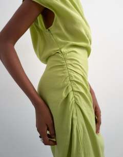Model wearing Grown on shoulder midi dress in green