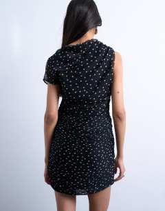 Model wearing Grown on shoulder sash dress in mono spot