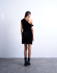 Model wearing Grown on twist shoulder velvet mini dress in black