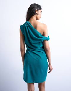 Model wearing Grown on twist shoulder velvet mini dress in teal