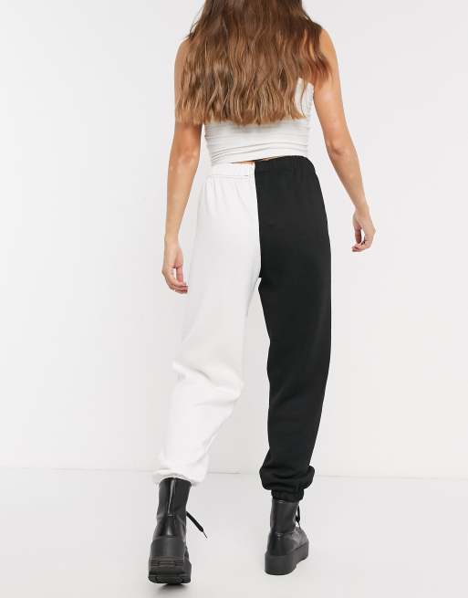 Half black half white track pants hot sale