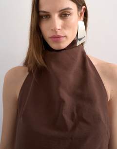Model wearing Halter cowl maxi dress in chocolate cupro
